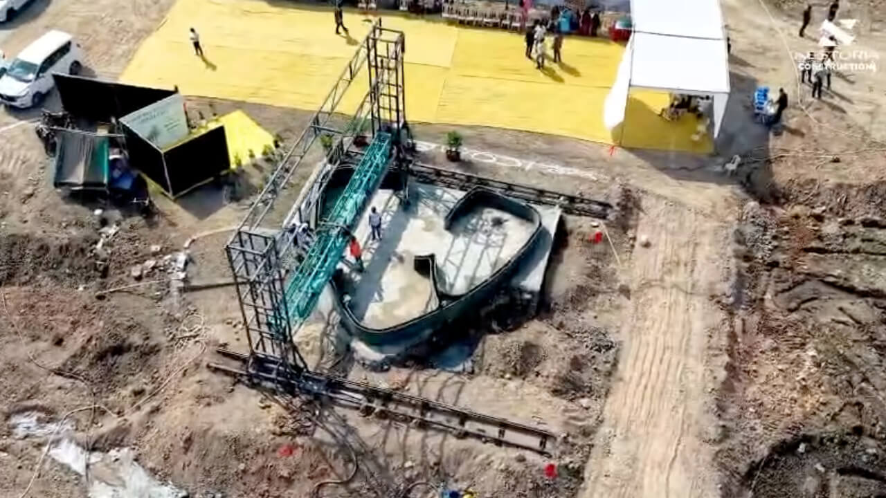 Aerial view showing 3D printed wall structures under construction at the Nestoria Atulyam site.