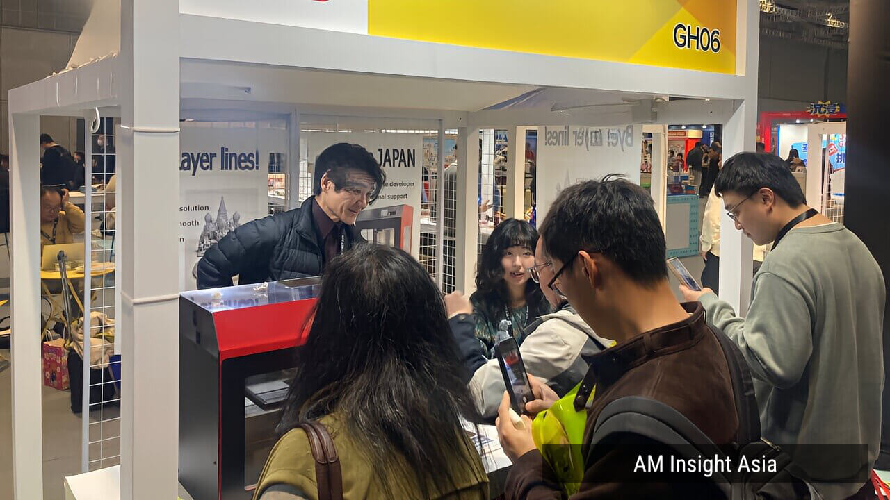 Visitors gather at the Qholia booth — a small stand that consistently drew crowds throughout the three-day show.