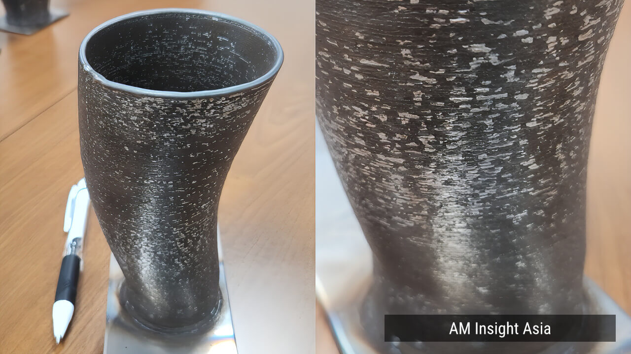 A cup-shaped printed part, showing fine layer lines | Photo: AM Insight Asia