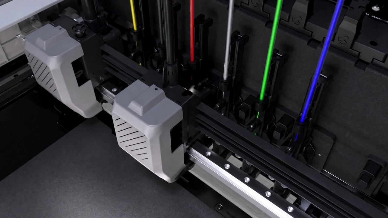 The IDEX system's two independent extruders, with six swappable toolheads docked behind them. | Photo: Sovol
