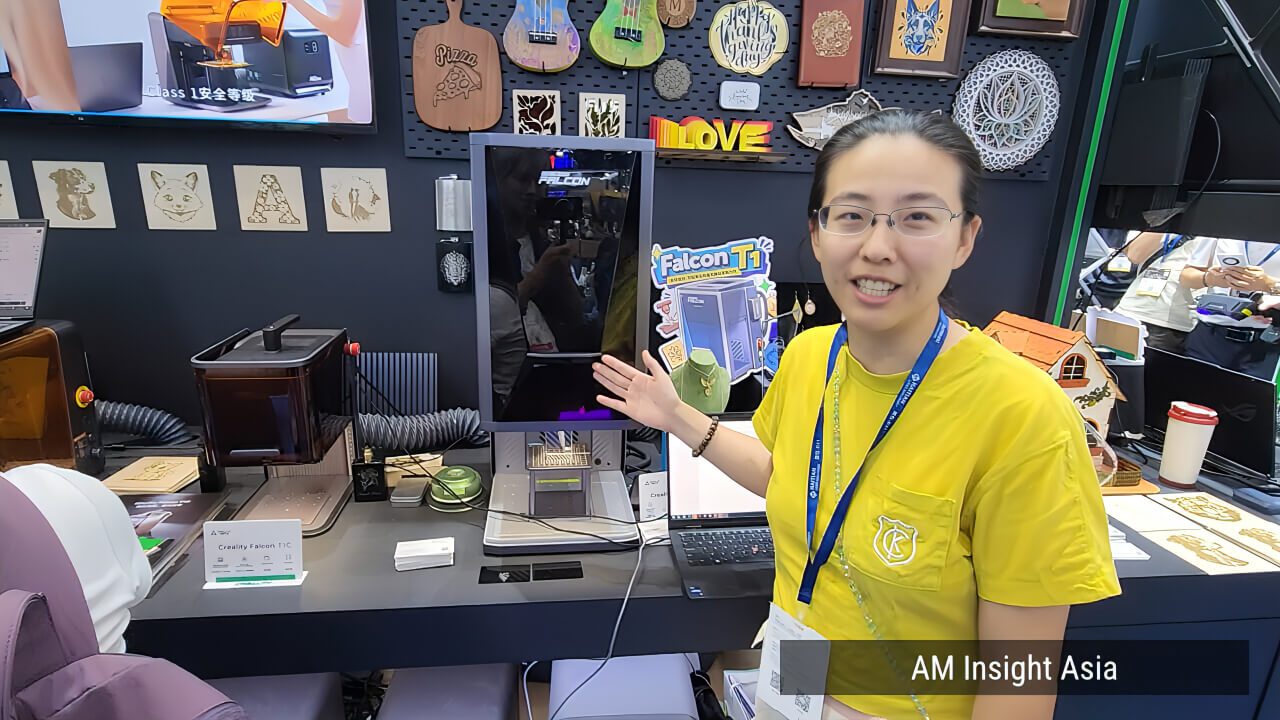 A Creality staff member demonstrating the Falcon T1 laser engraver. | Photo: AM Insight Asia