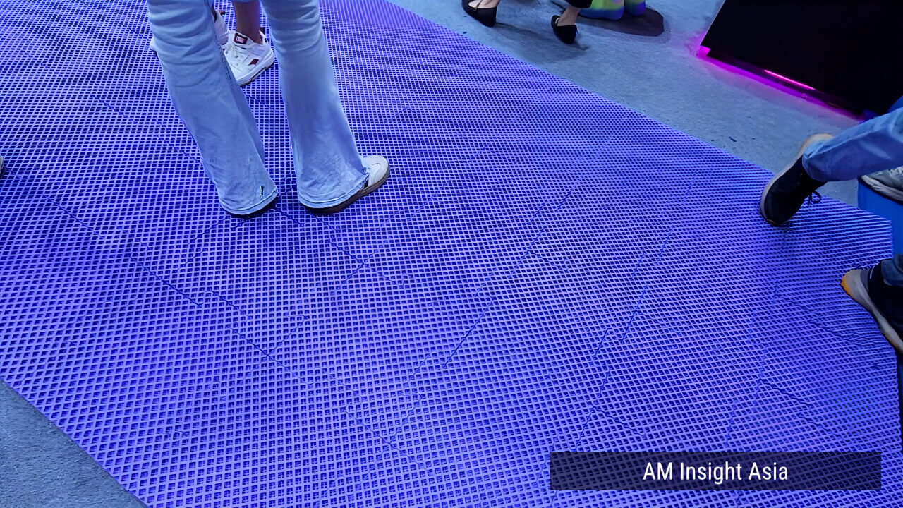 The 3D printed mat on display at PollyPolymer's booth. | Photo: AM Insight Asia
