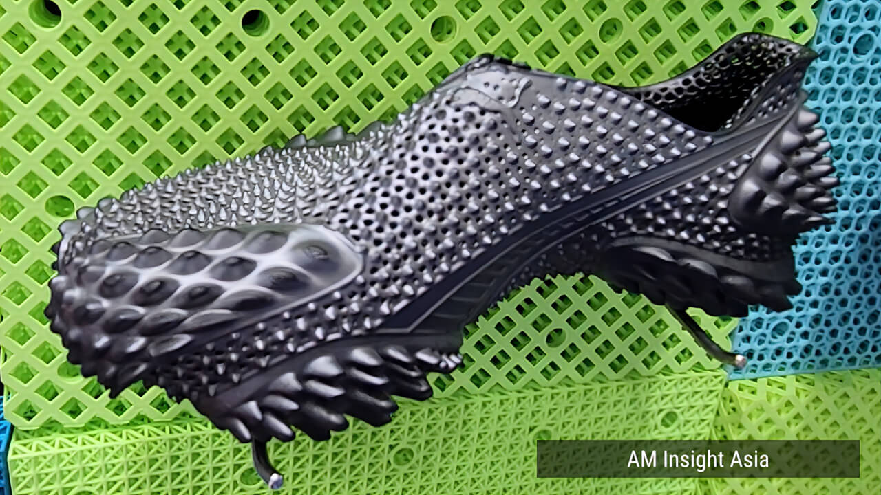 A range of 3D printed shoes in varied colors and designs, seen on the show floor at Formnext Asia Shenzhen 2026 | Photo: AM Insight Asia