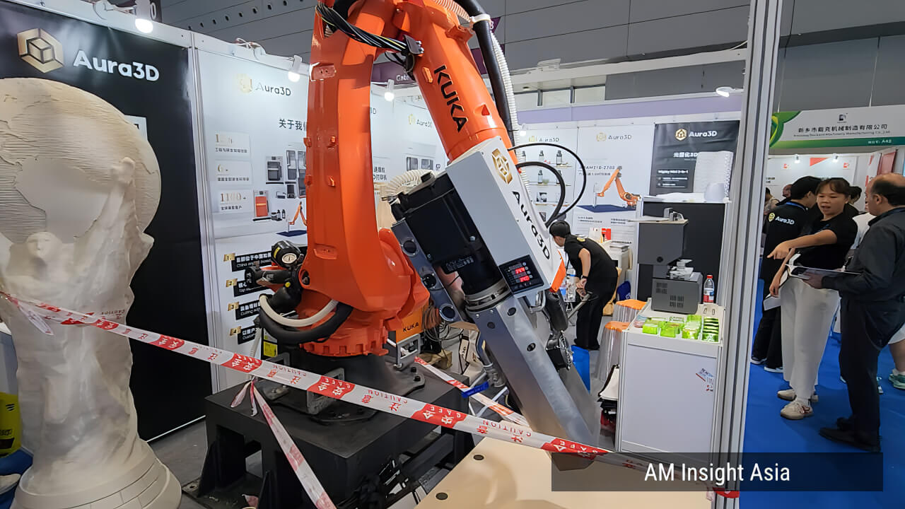 The six-axis robotic arm 3D printer at Aura3D's booth. | Photo: AM Insight Asia