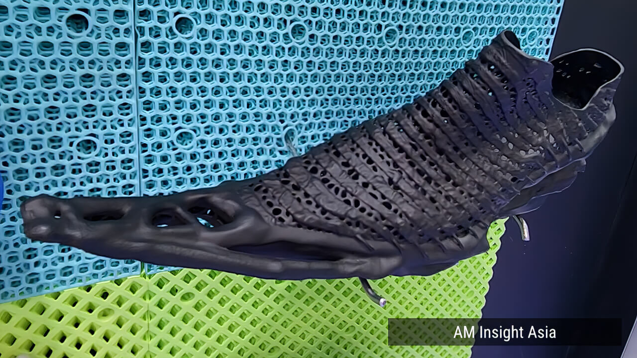 A range of 3D printed shoes in varied colors and designs, seen on the show floor at Formnext Asia Shenzhen 2026 | Photo: AM Insight Asia