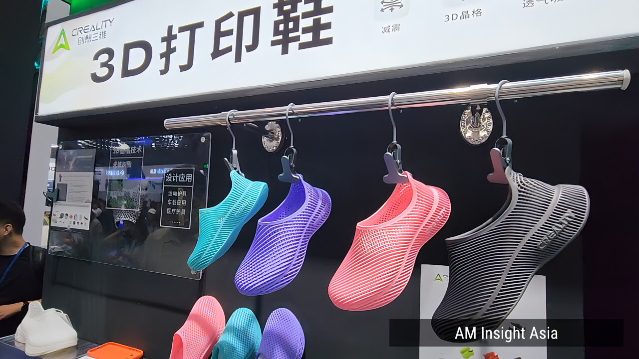 A range of 3D printed shoes in varied colors and designs, seen on the show floor at Formnext Asia Shenzhen 2026 | Photo: AM Insight Asia