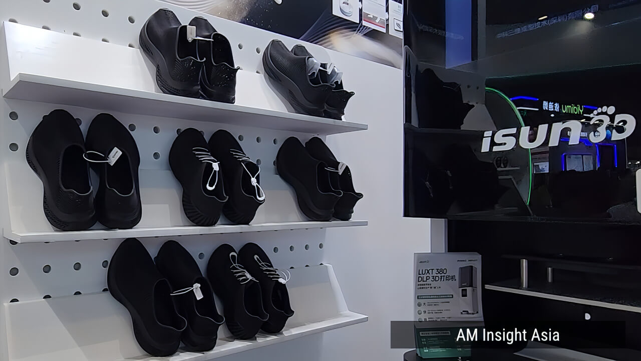 A range of 3D printed shoes in varied colors and designs, seen on the show floor at Formnext Asia Shenzhen 2026 | Photo: AM Insight Asia