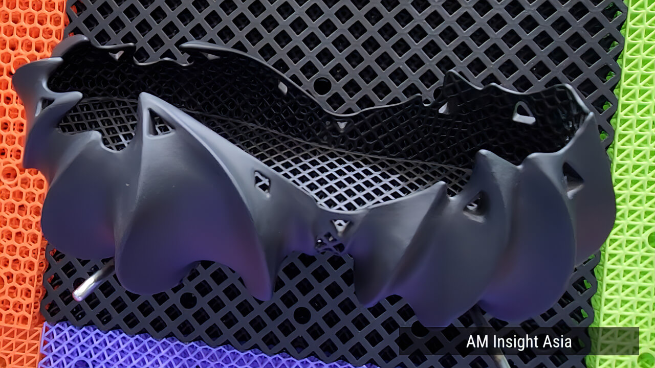 A range of 3D printed shoes in varied colors and designs, seen on the show floor at Formnext Asia Shenzhen 2026 | Photo: AM Insight Asia