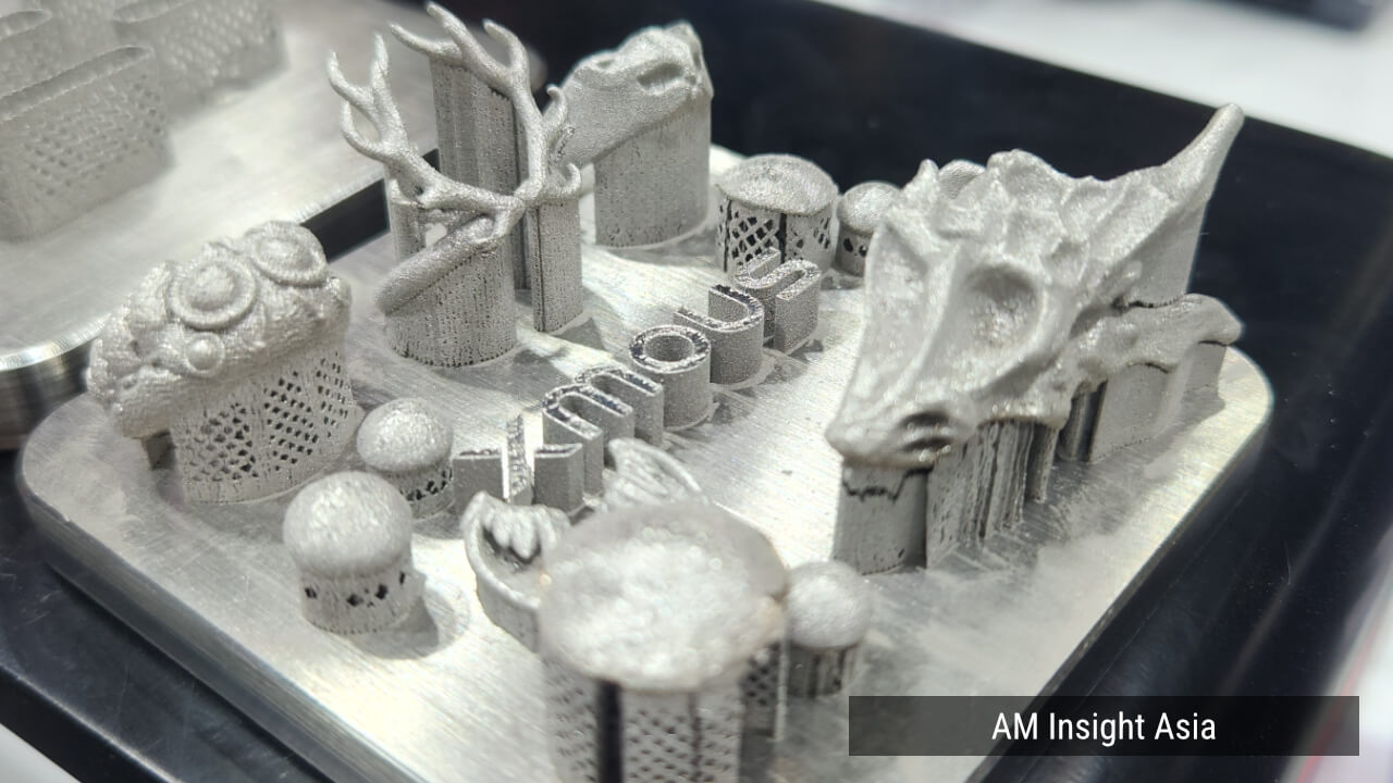 Sample parts still on the build plate, with supports attached. | Photo: AM Insight Asia
