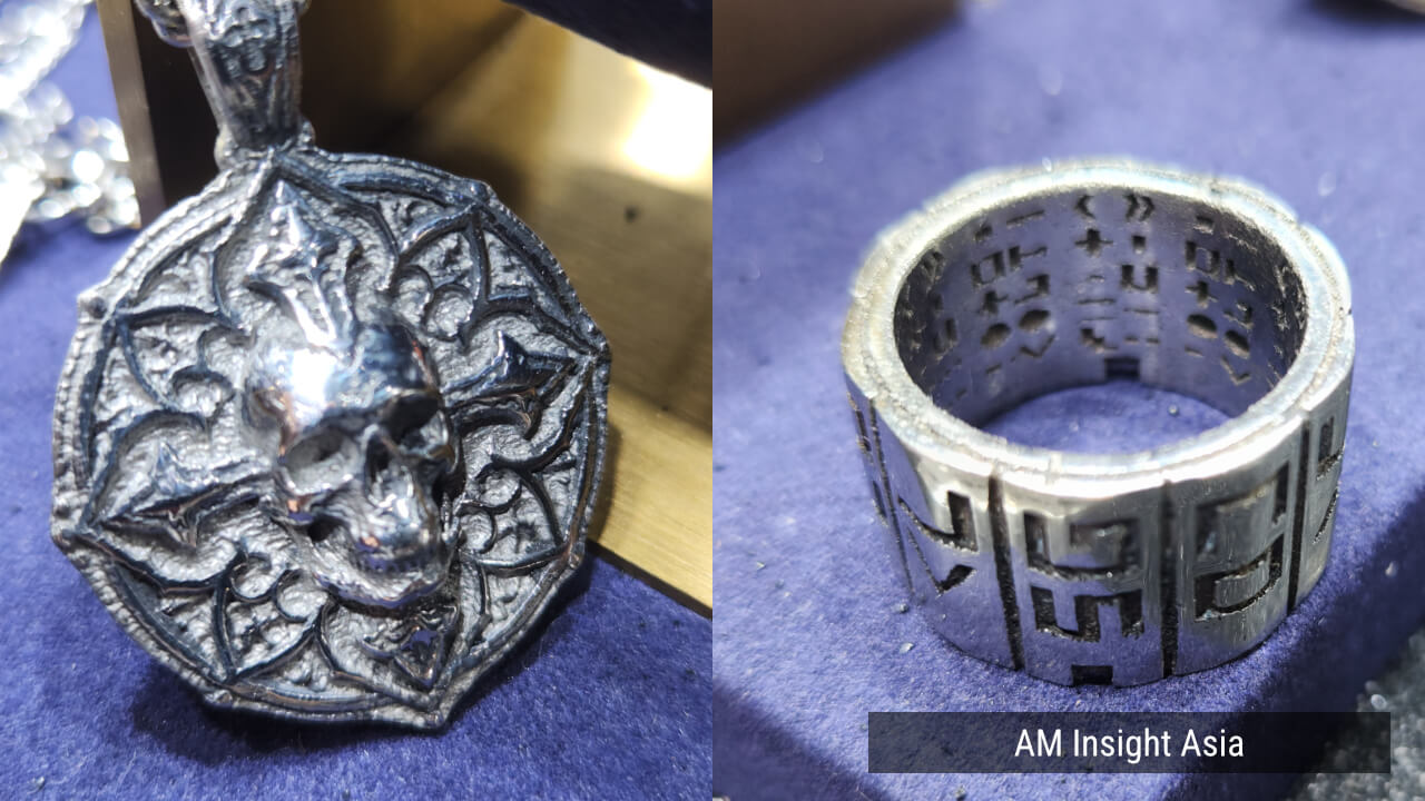 A skull pendant (left) and a ring with characters cut through to the inside (right). | Photo: AM Insight Asia